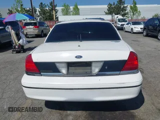1999 Ford Crown Victoria Police с VIN 2FAFP71W1XX200937, выставлен на аукционе IAAI как лот 41977836 с пробегом 186 379 миль миль и . История ставок и продаж доступна на DreamBid. Изображение 13.