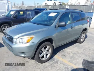 2006 Toyota RAV4 with VIN JTMZD33V465012121, listed as a IAAI auction lot 42013354 with 214,726 mi miles. Bid and sale history available at carsss.com. Image 2.