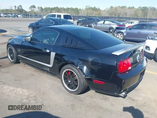 2006 Ford Mustang GT Deluxe with VIN 1ZVFT82H365148851, listed as a IAAI auction lot 41879208 with 150,095 mi miles. Bid and sale history available at carsss.com. Image 3.