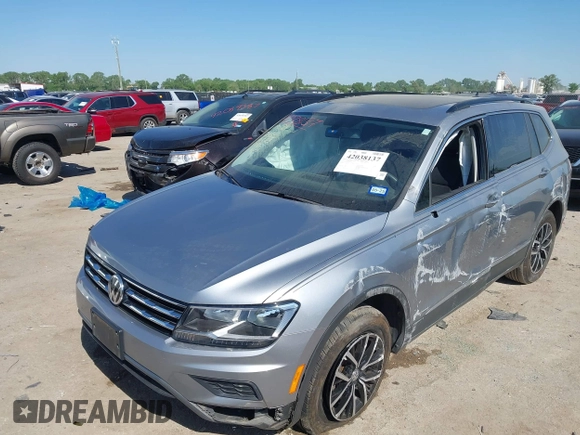 2021 Volkswagen Tiguan SE with VIN 3VV3B7AX0MM026064, listed as a IAAI auction lot 42038137 with 18,526 mi miles and . Bid and sale history available at DreamBid. Image 6.