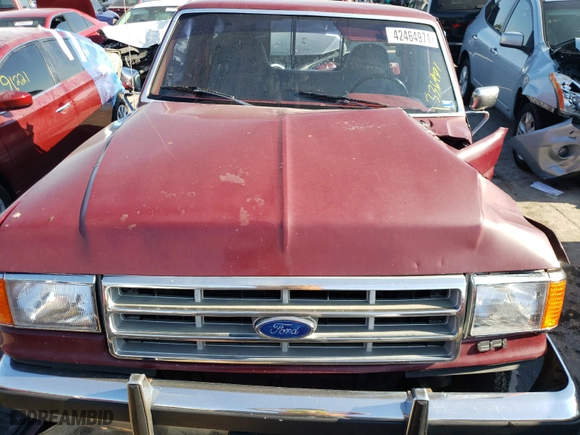 1988 Ford 1/2 Ton Trucks with VIN 1FTDF15N1JNA46726, listed as a Copart auction lot 42464971 with 336,491 mi miles and Salvage Title. Bid and sale history available at carsss.com. Image 7.