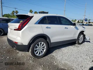 2023 Cadillac XT4 FWD Luxury with VIN 1GYAZAR42PF219114, listed as a Copart auction lot 61830125 with 23,508 mi miles and Salvage title. Bid and sale history available at DreamBid. Image 3.