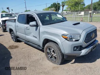 2019 Toyota Tacoma SR5 with VIN 5TFAZ5CN3KX086378, listed as a IAAI auction lot 41930434 with 77,332 mi miles and . Bid and sale history available at DreamBid. Image 1.