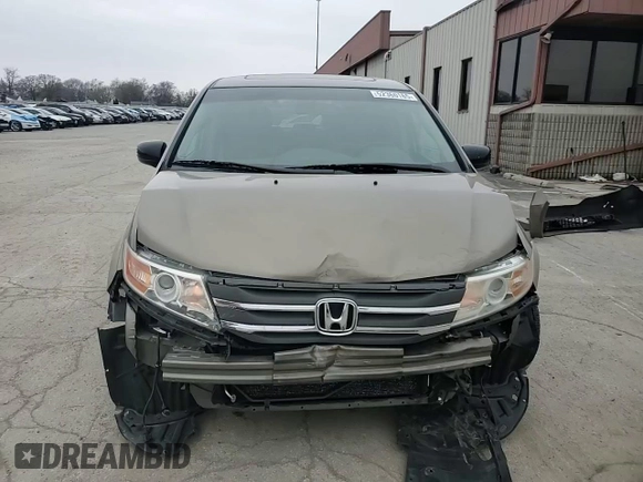 2012 Honda Odyssey Touring with VIN 5FNRL5H9XCB078399, listed as a Copart auction lot 52360165 with 174,819 mi miles and Salvage Title. Bid and sale history available at DreamBid. Image 11.