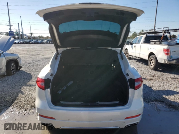 2018 Maserati Levante S z VIN ZN661YUL4JX284380, wystawiony jako Copart lot #42221935 z przebiegiem 49 156 mil mil oraz Nie do naprawy • Non repairable. Historia ofert i sprzedaży dostępna na DreamBid. Obrazek 6.