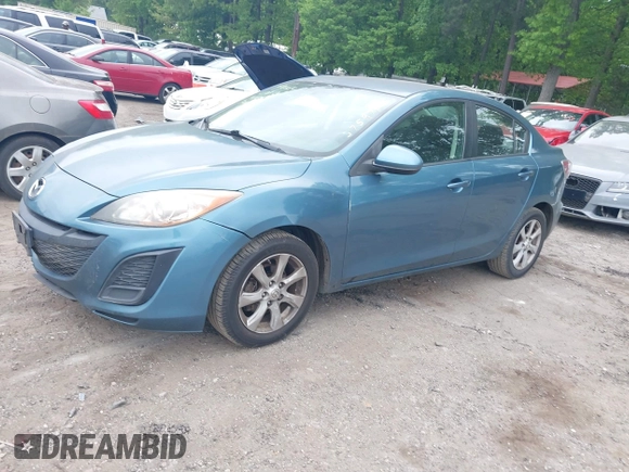 2011 Mazda Mazda3 i Touring with VIN JM1BL1VG4B1375978, listed as a IAAI auction lot 42120448 with 144,753 mi miles. Bid and sale history available at carsss.com. Image 2.