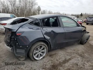 2024 Tesla Model Y Long Range with VIN 7SAYGAEE6RF070354, listed as a Copart auction lot 49826975 with Not Provided miles and Clean Title. Bid and sale history available at DreamBid. Image 3.
