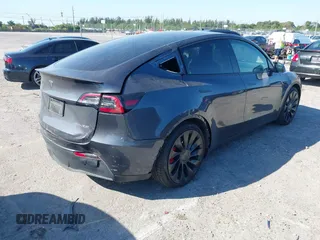 2022 Tesla Model Y Performance with VIN 7SAYGDEF6NF540094, listed as a IAAI auction lot 41786865 with 28,356 mi miles and . Bid and sale history available at DreamBid. Image 4.