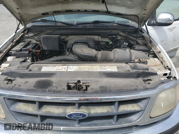 1998 Ford F-150 with VIN 2FTZX1766WCA27840, listed as a Copart auction lot 56186495 with 147,127 mi miles and Clean title. Bid and sale history available at DreamBid. Image 11.