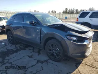 2024 Mazda CX-30 2.5 S Carbon Edition with VIN 3MVDMBCM1RM669385, listed as a Copart auction lot 86720434 with 4,651 mi miles and Salvage Title. Bid and sale history available at carsss.com. Image 4.