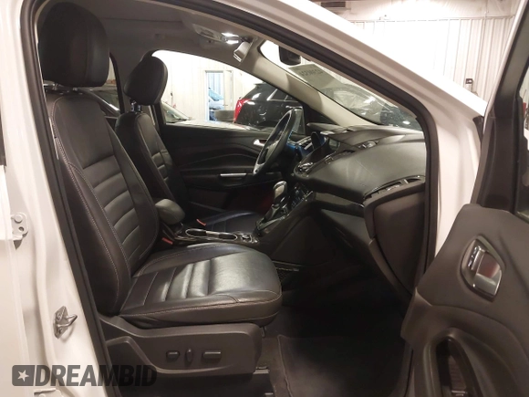 2016 Ford Escape Titanium with VIN 1FMCU9J99GUA61848, listed as a IAAI auction lot 42300324 with 51,692 mi miles and . Bid and sale history available at DreamBid. Image 5.