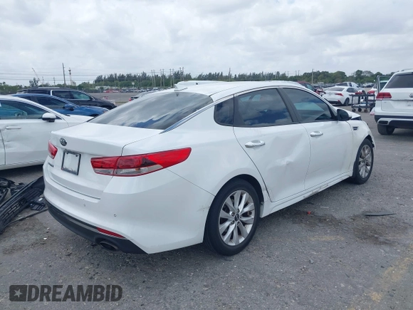 2018 Kia Optima LX with VIN 5XXGT4L34JG253597, listed as a IAAI auction lot 41915762 with 166,521 mi miles. Bid and sale history available at carsss.com. Image 4.
