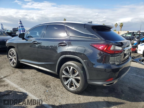 2021 Lexus RX with VIN 2T2HZMAA4MC206615, listed as a Copart auction lot 42412305 with 130,480 mi miles and Salvage Title. Bid and sale history available at carsss.com. Image 2.