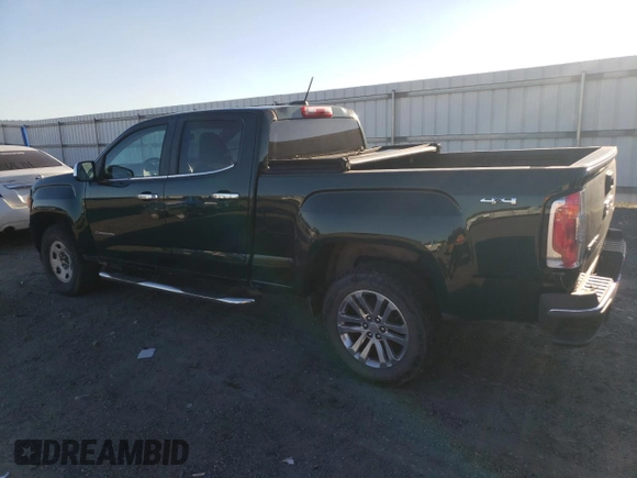 2015 GMC Canyon 4WD SLT with VIN 1GTG6CE35F1246241, listed as a Copart auction lot 74748254 with 126,389 mi miles and Salvage Title. Bid and sale history available at carsss.com. Image 2.