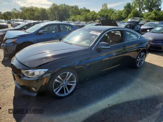 2016 BMW 4 Series 428i xDrive with VIN WBA3N9C52GK249387, listed as a Copart auction lot 65697805 with 203,385 mi miles and Clean title. Bid and sale history available at DreamBid. Image 1.