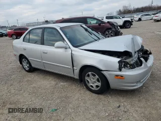 2004 Hyundai Accent GL with VIN KMHCG45C94U564176, listed as a Copart auction lot 82963944 with 454,400 mi miles and Salvage Title. Bid and sale history available at carsss.com. Image 4.