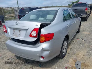 2009 Toyota Corolla with VIN 1NXBU40E89Z128911, listed as a IAAI auction lot 42714988 with 215,416 mi miles and . Bid and sale history available at DreamBid. Image 4.