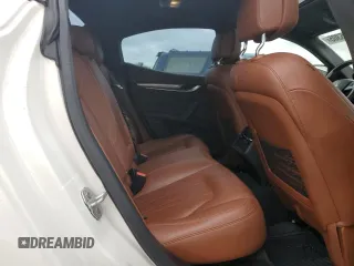 2018 Maserati Ghibli z VIN ZAM57XSA9J1271727, wystawiony jako Copart lot #52155305 z przebiegiem 62 081 mil mil oraz Szkoda całkowita • Salvage title. Historia ofert i sprzedaży dostępna na DreamBid. Obrazek 10.