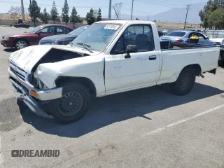 1993 Toyota Pickup DX with VIN JT4RN81P1P5169962, listed as a Copart auction lot 62419845 with 157,364 mi miles and Salvage title. Bid and sale history available at DreamBid. Image 1.