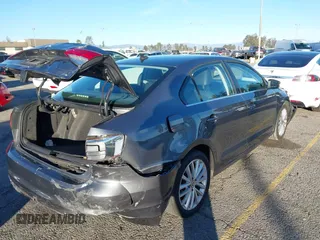 2015 Volkswagen Jetta Sport with VIN 3VWD17AJ2FM318669, listed as a IAAI auction lot 41266868 with 124,539 mi miles and . Bid and sale history available at DreamBid. Image 4.