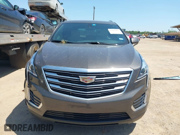 2019 Cadillac XT5 FWD z VIN 1GYKNARS1KZ235083, wystawiony jako IAAI lot #42002995 z przebiegiem 117 430 mil mil oraz . Historia ofert i sprzedaży dostępna na DreamBid. Obrazek 13.