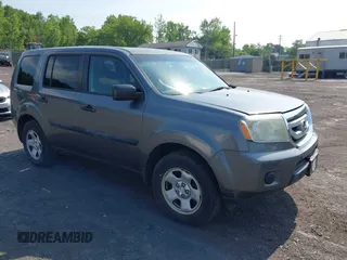 2011 Honda Pilot LX z VIN 5FNYF4H2XBB059849, wystawiony jako IAAI lot #42498198 z przebiegiem 212 945 mil mil oraz . Historia ofert i sprzedaży dostępna na DreamBid. Obrazek 1.