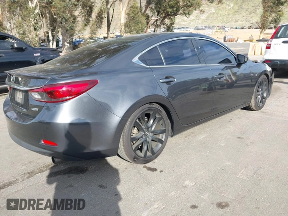 2016 Mazda Mazda6 i Grand Touring with VIN JM1GJ1W57G1441102, listed as a IAAI auction lot 41687057 with 144,876 mi miles. Bid and sale history available at carsss.com. Image 4.