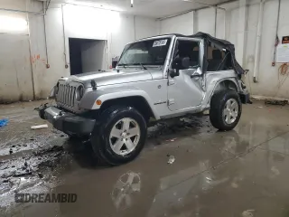 2009 Jeep Wrangler Sahara z VIN 1J4FA54189L789642, wystawiony jako Copart lot #89078145 z przebiegiem 128 902 mil mil oraz Szkoda całkowita • Salvage title. Historia ofert i sprzedaży dostępna na DreamBid. Obrazek 1.