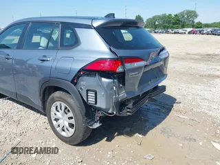 2022 Toyota Corolla Cross L with VIN 7MUAAABGXNV035110, listed as a IAAI auction lot 42562359 with 17,106 mi miles and . Bid and sale history available at DreamBid. Image 6.
