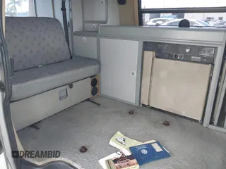 1997 Volkswagen EuroVan CV с VIN WV2EH8705VH077041, выставлен на аукционе IAAI как лот 42481515 с пробегом 144 миль миль и . История ставок и продаж доступна на DreamBid. Изображение 8.