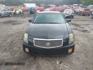 2006 Cadillac CTS z VIN 1G6DP577760152947, wystawiony jako IAAI lot #42121484 z przebiegiem 186 780 mil mil oraz . Historia ofert i sprzedaży dostępna na DreamBid. Obrazek 6.