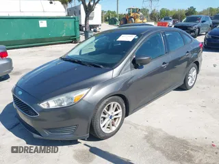 2018 Ford Focus SE z VIN 1FADP3F27JL245603, wystawiony jako IAAI lot #41773395 z przebiegiem 94 044 mil mil oraz . Historia ofert i sprzedaży dostępna na DreamBid. Obrazek 17.