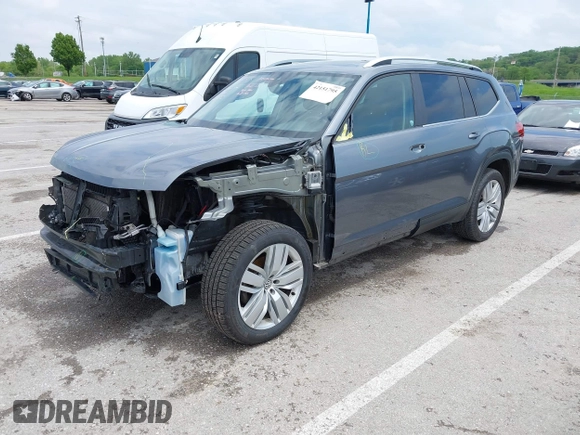 2019 Volkswagen Atlas SE z VIN 1V2WR2CAXKC611864, wystawiony jako IAAI lot #42151795 z przebiegiem 90 178 mil mil oraz . Historia ofert i sprzedaży dostępna na DreamBid. Obrazek 17.