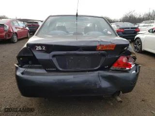 2004 Mitsubishi Lancer LS with VIN JA3AJ36E34U036316, listed as a Copart auction lot 87617655 with 140,855 mi miles and Salvage Title. Bid and sale history available at carsss.com. Image 6.