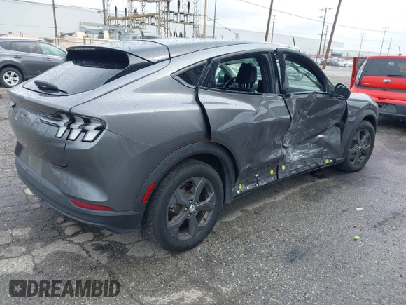 2021 Ford Mustang Mach-E Select with VIN 3FMTK1RM8MMA35029, listed as a IAAI auction lot 41792032 with 95,917 mi miles and . Bid and sale history available at DreamBid. Image 4.