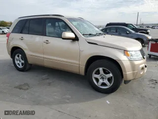 2006 Suzuki Grand Vitara Luxury with VIN JS3TE947764103607, listed as a Copart auction lot 82912094 with 158,406 mi miles and Salvage Title. Bid and sale history available at carsss.com. Image 4.