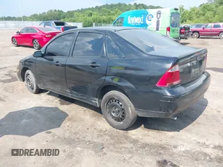 2006 Ford Focus S with VIN 1FAFP34N76W233950, listed as a IAAI auction lot 42596698 with 262,504 mi miles and . Bid and sale history available at DreamBid. Image 3.