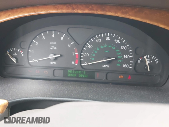 2002 Jaguar S-Type with VIN SAJDA01P12GM35163, listed as a IAAI auction lot 41097415 with 114,017 mi miles and . Bid and sale history available at DreamBid. Image 7.