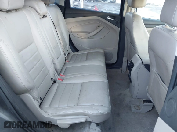 2015 Ford Escape Titanium with VIN 1FMCU0J92FUB74972, listed as a IAAI auction lot 41164519 with 228,785 mi miles and . Bid and sale history available at DreamBid. Image 8.
