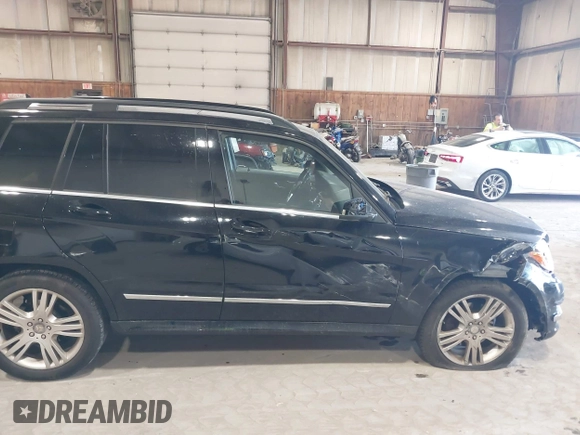 2015 Mercedes-Benz GLK with VIN WDCGG8JB0FG364079, listed as a IAAI auction lot 42096003 with 113,571 mi miles. Bid and sale history available at carsss.com. Image 18.