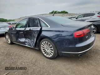 2015 Audi A8 4.0T with VIN WAUJ2AFD6FN011009, listed as a Copart auction lot 64173005 with 153,377 mi miles and Salvage title. Bid and sale history available at DreamBid. Image 2.