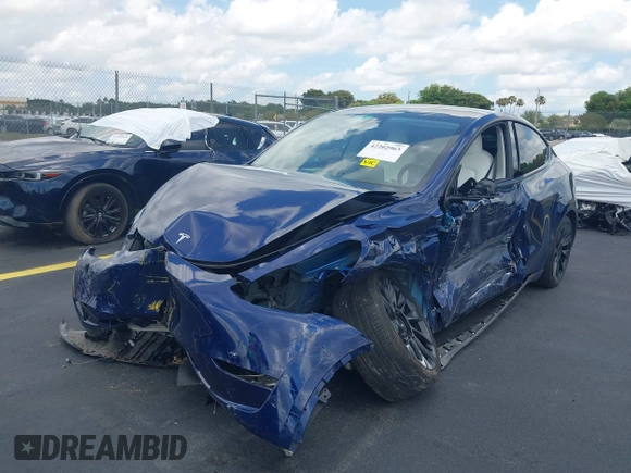 2024 Tesla Model Y с VIN 7SAYGDED8RF015882, выставлен на аукционе IAAI как лот 42202963 с пробегом 10 597 миль миль и . История ставок и продаж доступна на DreamBid. Изображение 6.