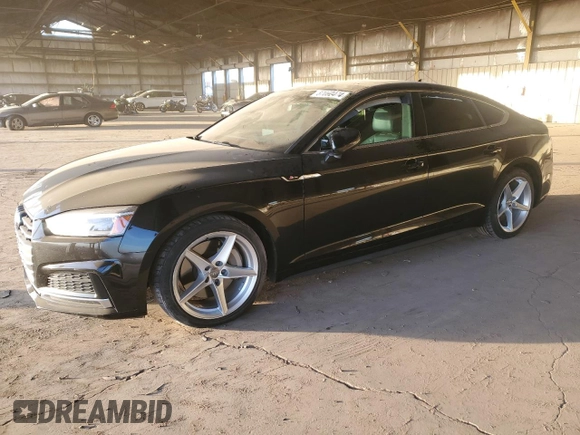 2018 Audi A5 Sportback Premium with VIN WAUDNCF52JA004082, listed as a Copart auction lot 87002474 with 84,790 mi miles and Salvage Title. Bid and sale history available at carsss.com. Image 1.