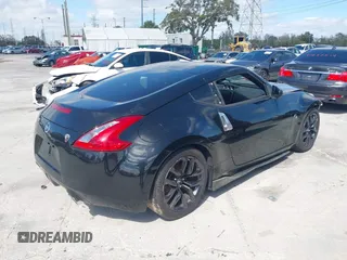 2017 Nissan 370Z with VIN JN1AZ4EH5HM954458, listed as a IAAI auction lot 41629907 with 113,606 mi miles. Bid and sale history available at carsss.com. Image 4.