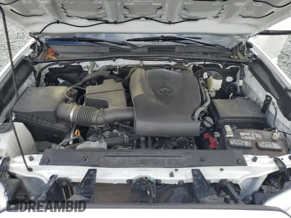 2021 Toyota Tacoma SR с VIN 3TMCZ5AN4MM386662, выставлен на аукционе Copart как лот 56954865 с пробегом 70 623 миль миль и Списание • Salvage title. История ставок и продаж доступна на DreamBid. Изображение 11.