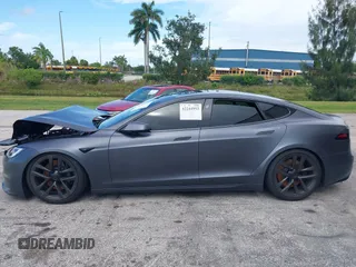 2023 Tesla Model S with VIN 5YJSA1E54PF501565, listed as a IAAI auction lot 42244953 with Not provided miles and . Bid and sale history available at DreamBid. Image 13.