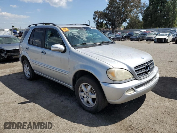 2004 Mercedes-Benz M-Class with VIN 4JGAB75EX4A470494, listed as a Copart auction lot 52024515 with 185,639 mi miles and Salvage Title. Bid and sale history available at carsss.com. Image 4.