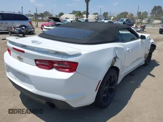 2019 Chevrolet Camaro 1LT with VIN 1G1FB3DX9K0140041, listed as a IAAI auction lot 42799146 with 140,681 mi miles and . Bid and sale history available at DreamBid. Image 4.