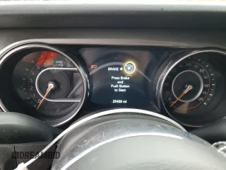 2023 Jeep Wrangler Sahara with VIN 1C4HJXEN1PW598815, listed as a Copart auction lot 42964275 with 29,458 mi miles and Salvage Title. Bid and sale history available at carsss.com. Image 9.