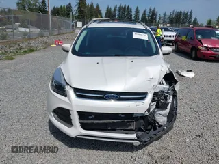 2016 Ford Escape Titanium with VIN 1FMCU9J93GUA40252, listed as a IAAI auction lot 42000778 with 37,914 mi miles. Bid and sale history available at carsss.com. Image 13.